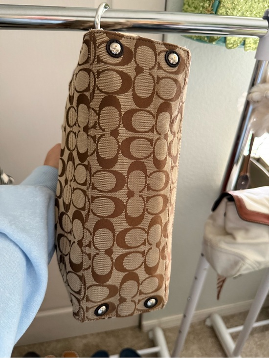 Coach Signature Canvas Shoulder Bag in Brown. Matching Coach wallet main image 9